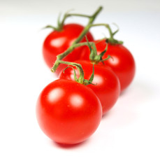 Cherry tomatoes isolated on white
