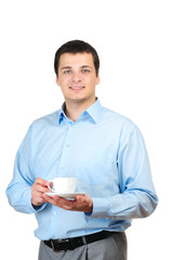 Young man holding cup of coffee (or tea) isolated on white