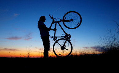 Obraz premium Silhouette of biker