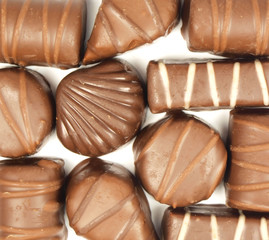 Chocolate sweets isolated on white