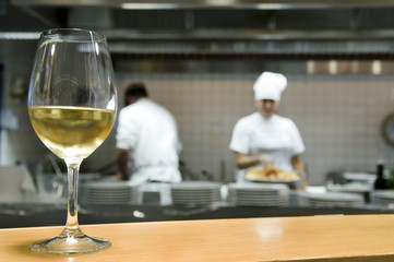 White wine glass in a restaurant kitchen