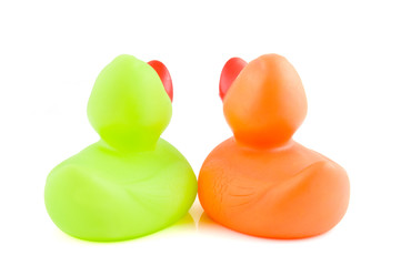 Back side of two colorful rubber ducks