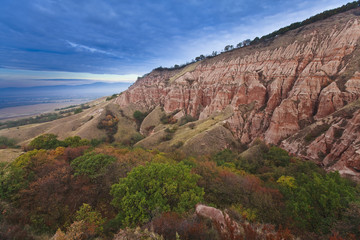 Red rocks in canyon in the fall and blue sky
