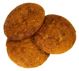 Three oatmeal cookies isolated on white background