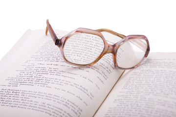glasses with book