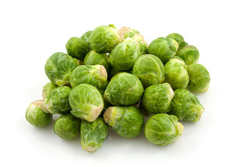 Brussels sprouts over white background