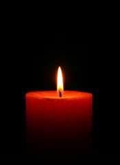 Close up of a candle with black background - 18098967