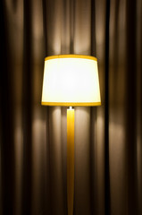 lamp against curtain