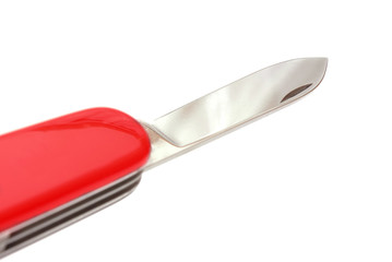 photo of penknife with red handle and open blade isolated