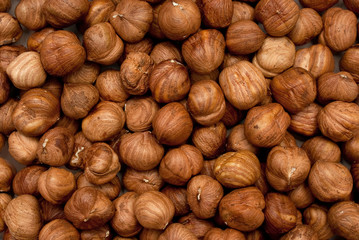 Top view of hazelnuts forming textured background