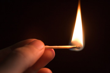 Burning match closeup