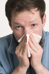 young man with tissue