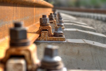 Obraz na płótnie Canvas rusty bolt from trolley track