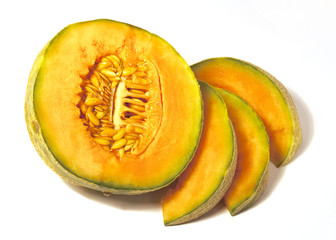 Halved melons and slices isolated on white background.