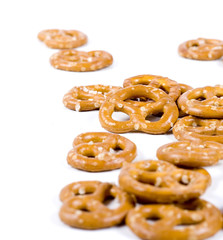 Salted pretzels isolated on white