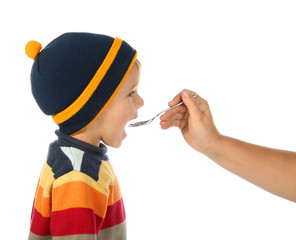 little open-mouthed boy with spoon