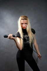beautiful young blonde girl with microphone