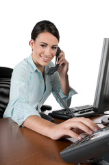 Young businesswoman on the phone at work, isolated on white