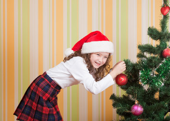 girl near christmas tree