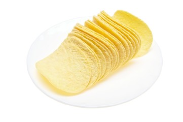 chips on a plate isolated on white