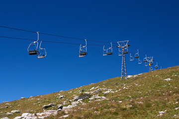 Empty cable cars in a swiss ski resort in summer
