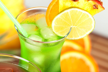Green tropical cocktail with pineapple
