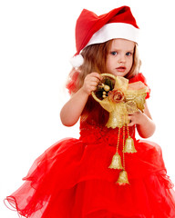 Child girl in red santa hat with christmas bell. Isolated.