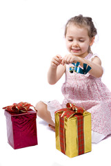 Girl about to open her Christmas presents