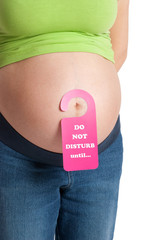 Pregnant belly with door-sign