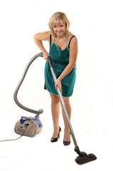 The housewife with vacuum cleaner