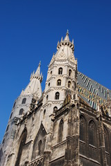 Fototapeta na wymiar View of St. Stephen's Cathedral (Stephansdom) agains blue sky at Stephansplatz in Vienna, Austria, Europe. 