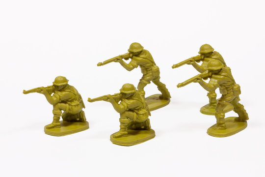 Plastic toy soldiers isolated on white