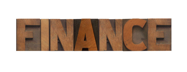 the word finance in old wood type