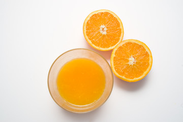 Fototapeta na wymiar Orange juice and oranges