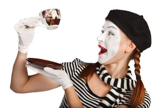 Mime comedian drinking coffee