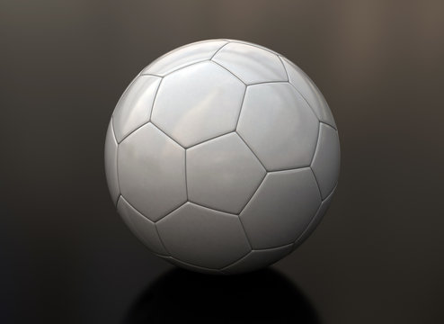 Soccer ball on shiny floor