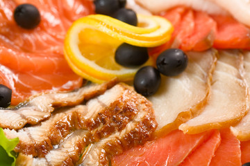 Cooked salmon fillets in assortment