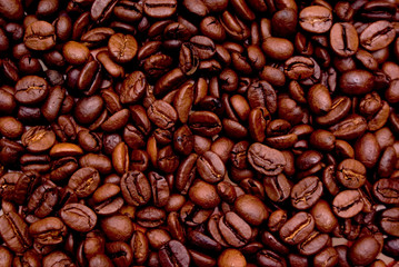Top view of coffee beans forming background