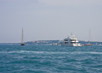 Fototapeta premium Yacht and Sailboats in Bay