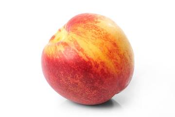 Fresh nectarine isolated on white background.