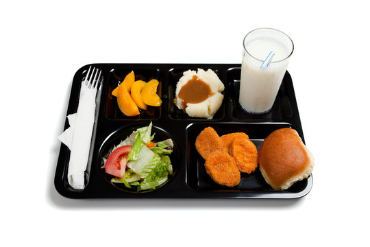 A black school lunch tray on a white background