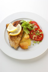 grilled carp fillet with potato and vegetable
