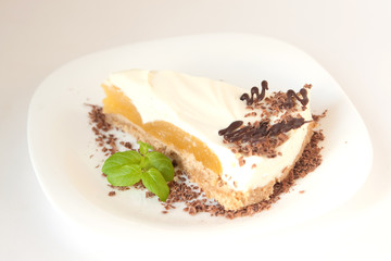 Vanilla cheesecake with peach and chocolate chips