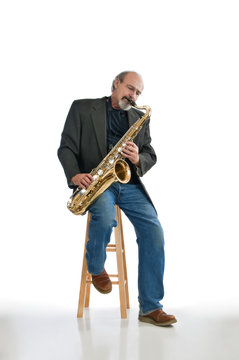 Man playing blues on a tenor sax