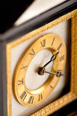 Detail of antique gold and black clock