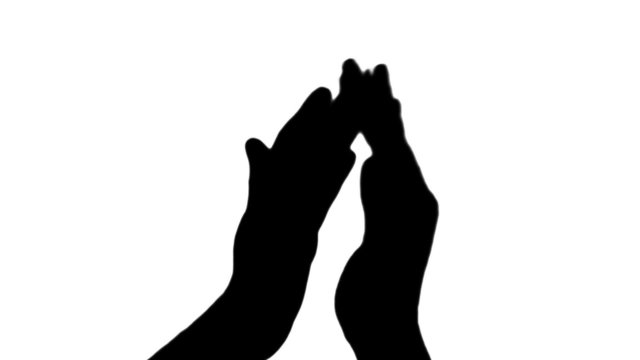 Clapping in silhouette against white - HD