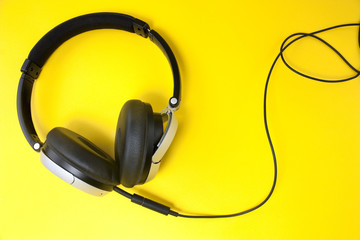 headphones on yellow