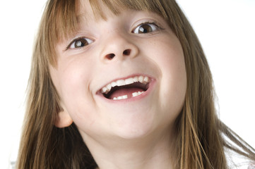 Cute little girl with missing tooth
