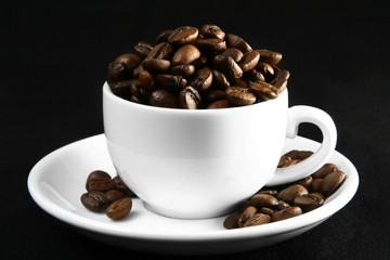 coffee time, a cup of beans on a black background