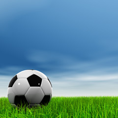 Fototapeta premium 3D czarna piłka, zielona trawa i błękitne niebo z chmurami